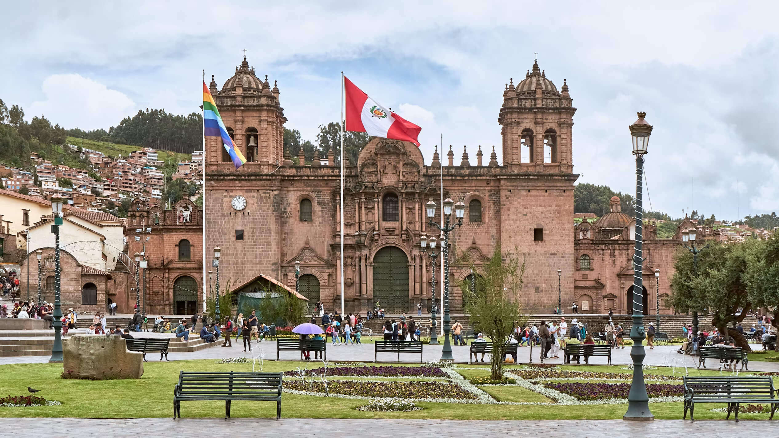 Cusco Plaza de Armas with cathedral and mountains in background