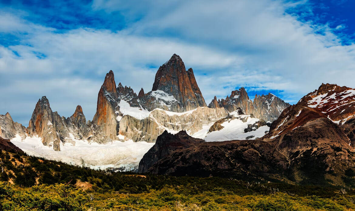 Snow-capped Monte Fitz Roy towering above a rugged landscape